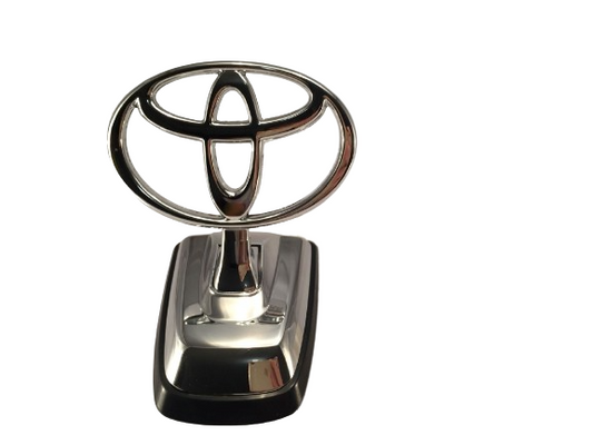 7530360070 Toyota LandCruiser UZJ100 HZJ105 HDJ100 FZJ105 Bonnet Badge Hood Emblem Genuine